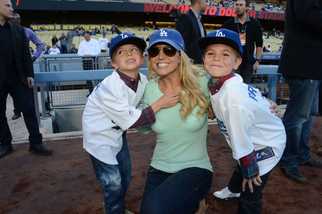Britney Spears poses with sons Jayden James Federline (L) and Sean Preston Federline (R) at Dodger Stadium on April 17, 2013.