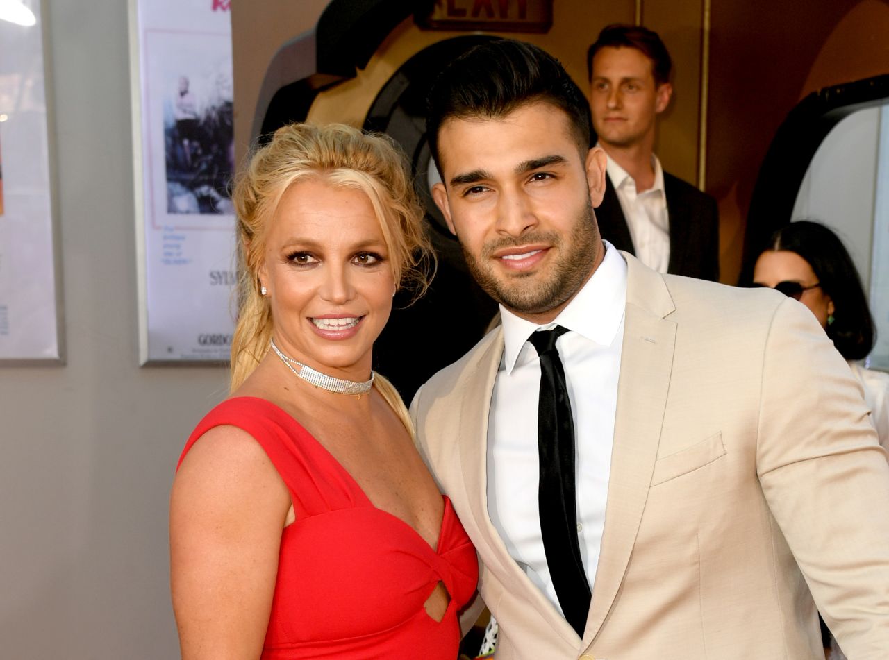 Spears and her boyfriend Sam Asghari attend a Hollywood premiere in 2019. A couple of months earlier, she had checked out of a mental-health treatment facility after undertaking an "all-encompassing wellness treatment."