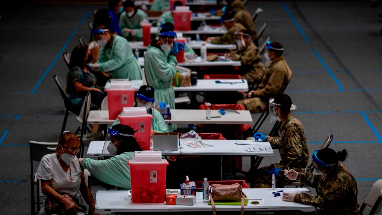 Senior citizens receive Covid-19 vaccines at a National Guard vaccination center in San Juan on February 8, 2021.