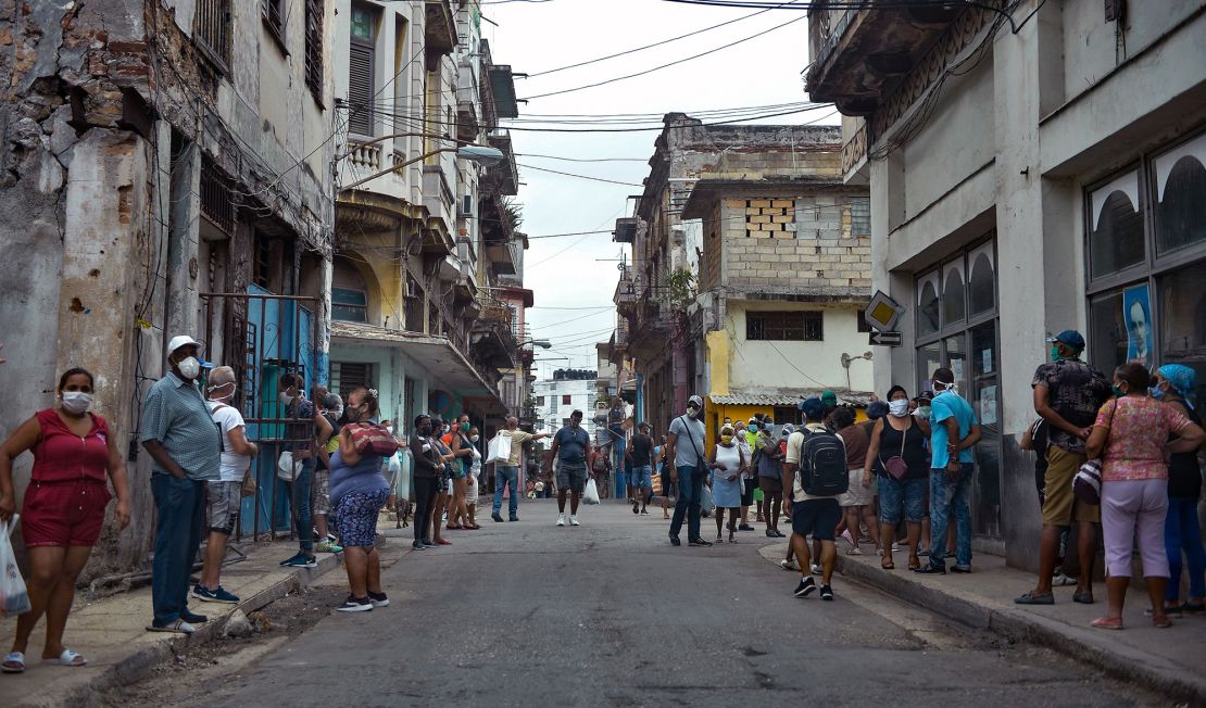 People line up to buy food in Havana, on February 2, 2021, as Covid-19 cases surge in the island nation.