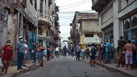People line up to buy food in Havana, on February 2, 2021, as Covid-19 cases surge in the island nation.