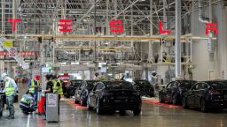 Employees work at the Tesla Gigafactory in Shanghai, east China, Nov. 20, 2020. 
