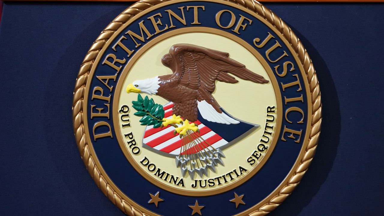 The Department of Justice seal is seen on a lectern in Washington, DC, in 2018.