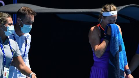Victoria Azarenka leaves the court to receive medical attention.