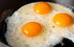 Eggs are low in saturated fat but very high in cholesterol. This food accounts for a quarter of the cholesterol in the American diet.