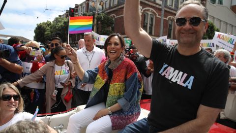 Then-Sen. Kamala Harris and husband Douglas Emhoff wave during the SF Pride Parade on June 30, 2019, in San Francisco.