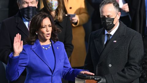 Kamala Harris, flanked by husband Doug Emhoff, is sworn in as the 49th US Vice President on January 20 at the US Capitol in Washington. 