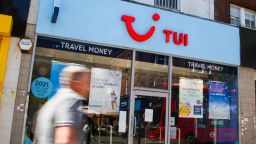 LONDON, UNITED KINGDOM - 2020/07/30: A man walks past a TUI store.
TUI stores are reopening some shops, it has announced. It will mean the travel agent will be able to help customers with any questions they may have about existing bookings and future holidays. It will also give people the opportunity to talk to staff face-to-face and try and resolve any issues. (Photo by Dinendra Haria/SOPA Images/LightRocket via Getty Images)