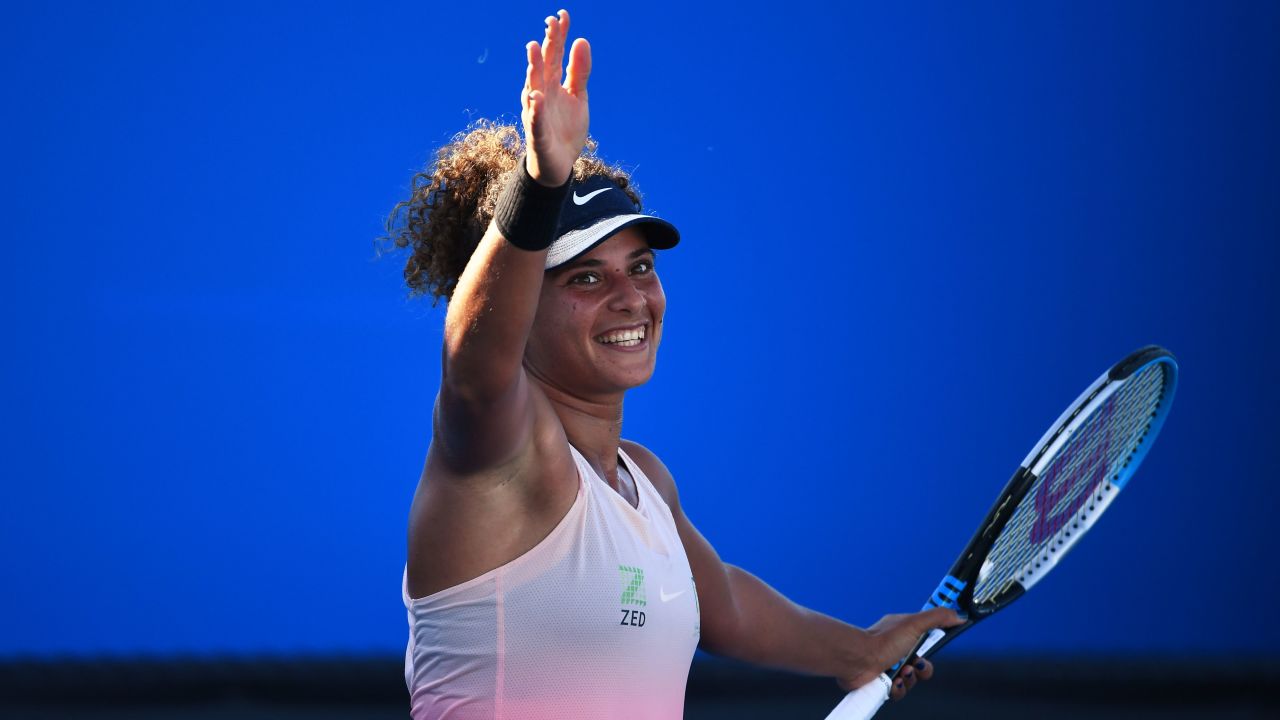 Sherif celebrates her first-round win at the Australian Open.
