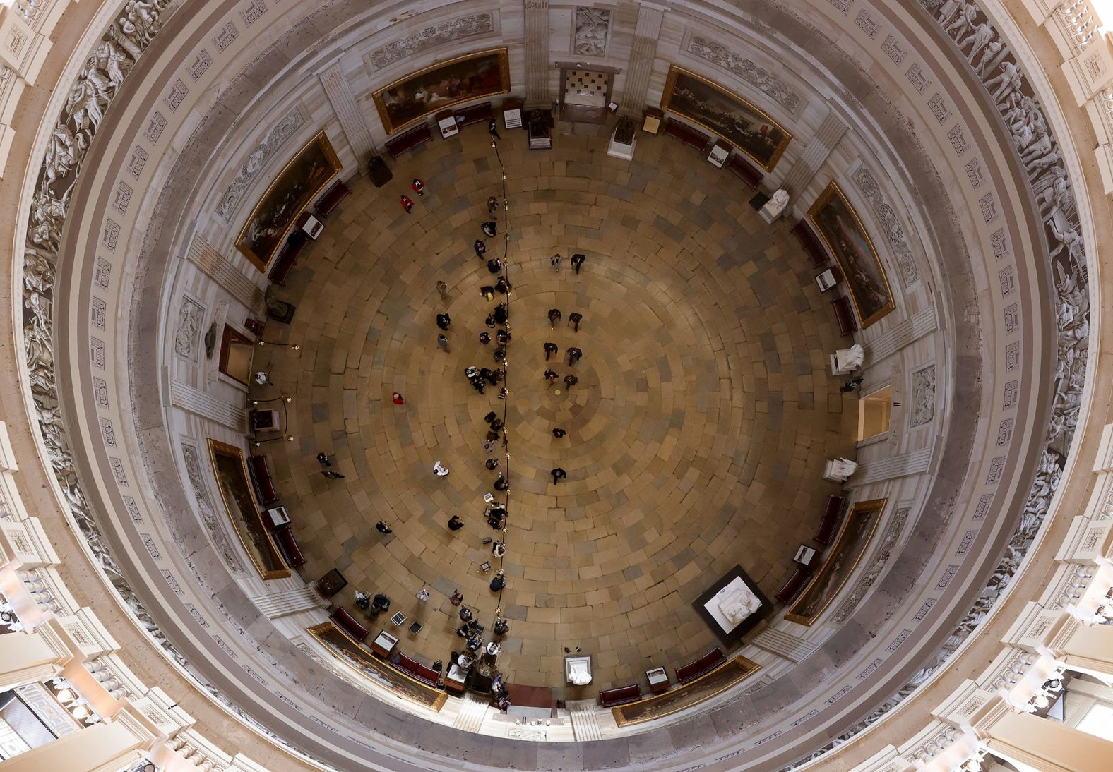 The House impeachment managers walk through the US Capitol Rotunda on Tuesday, February 9.