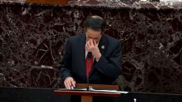 Rep. Jamie Raskin wipes his eyes while sharing a personal story on the Senate floor reflecting on the events of January 6.