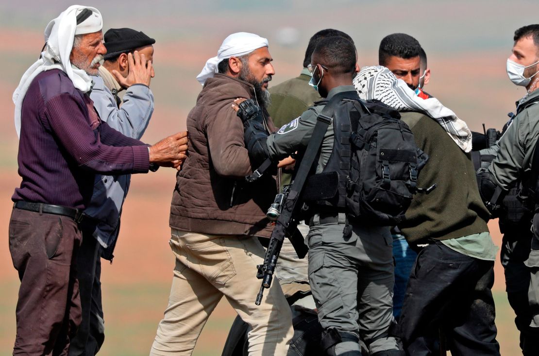 Residents clash with Israeli security forces as soldiers demolish Bedouin tents and structures, east of the village of Tubas, in the West Bank, on February 8, 2021. 