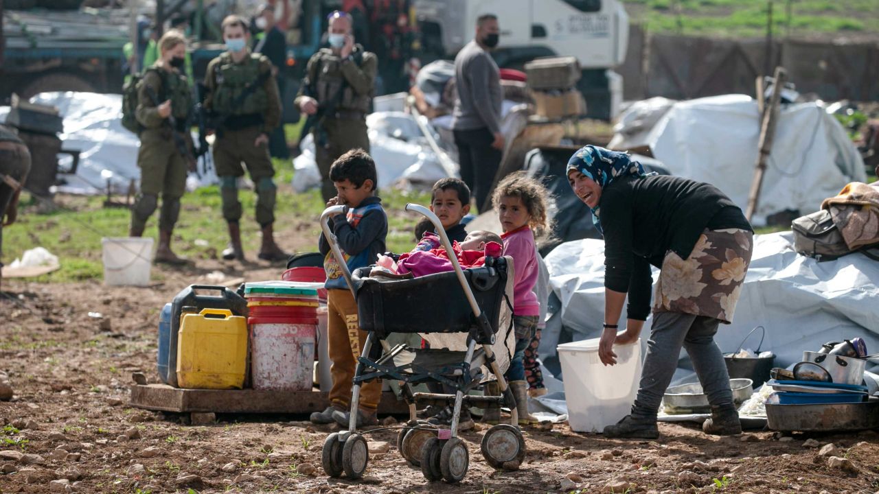 Residents react as Israeli forces demolish tents and structures near Tubas on February 8, 2021.
