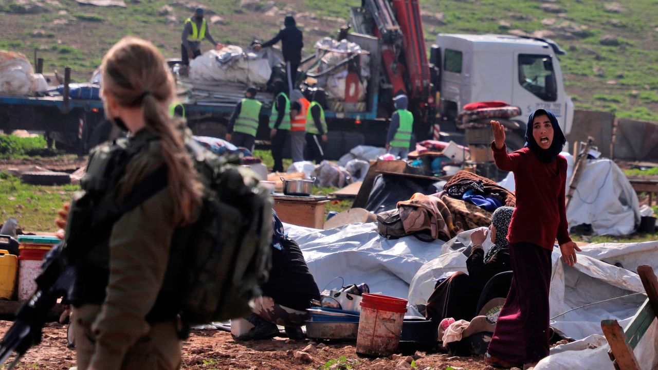 A resident reacts as Israeli forces demolish tents and structures near Tubas on February 8.