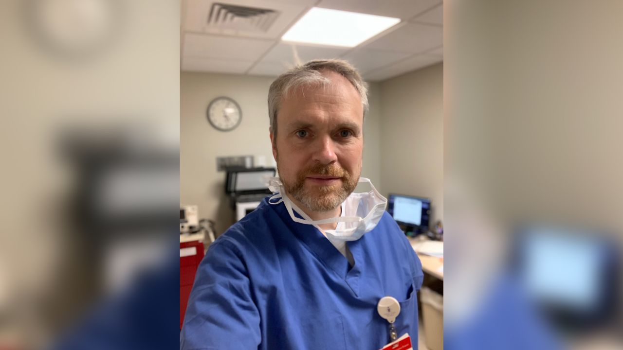 Dr. Ben Moor has created a program at his Massachusetts hospital where fully vaccinated employees visit Covid-19 patients to comfort and assist them.