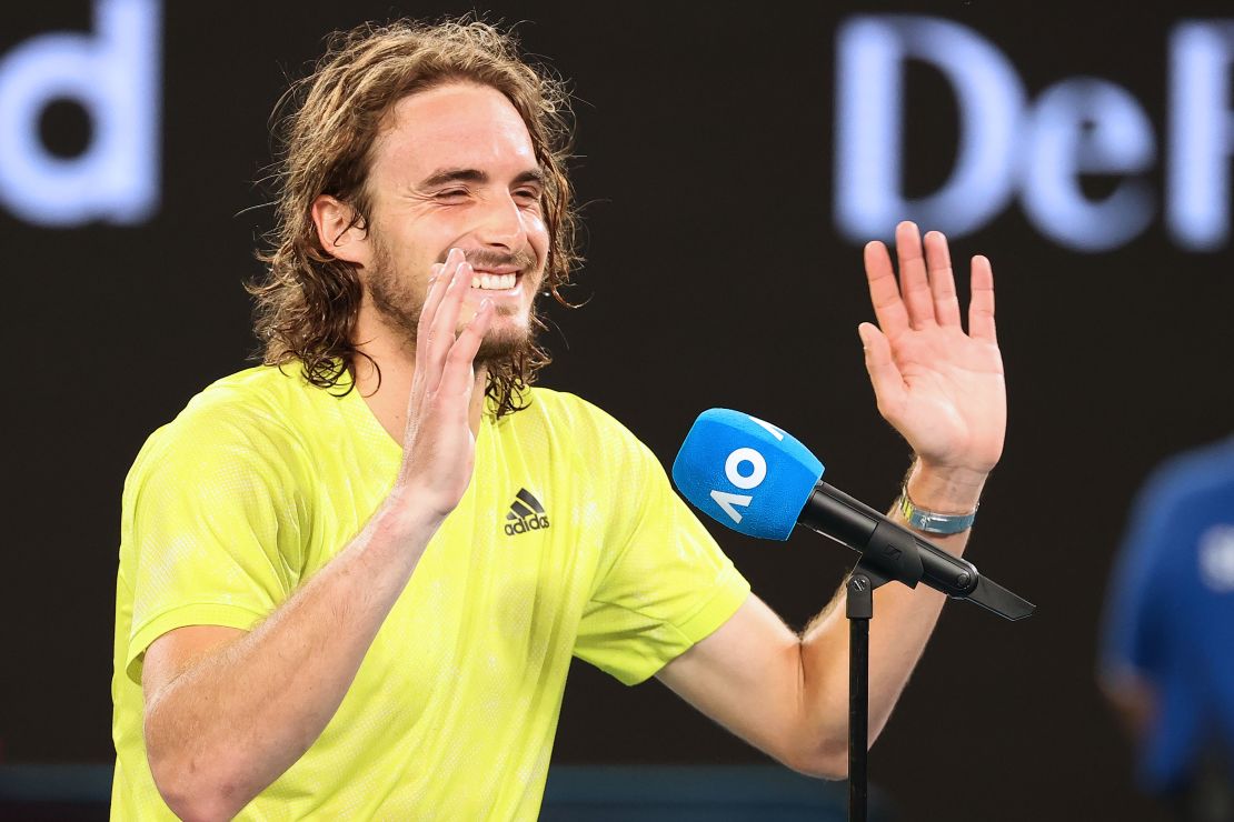 Stefanos Tsitsipas laughs while giving his interview. 
