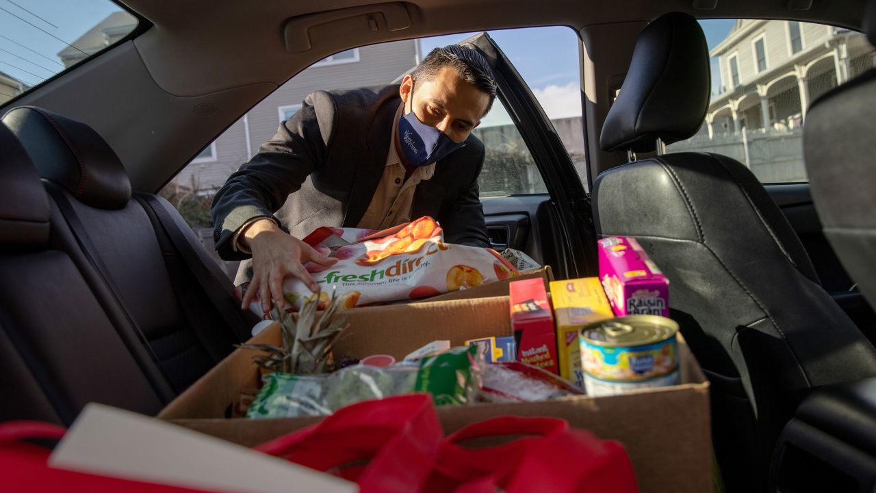 Community health worker Luis Hernandez delivers groceries to families with Covid-19 in Stamford, Connecticut. 