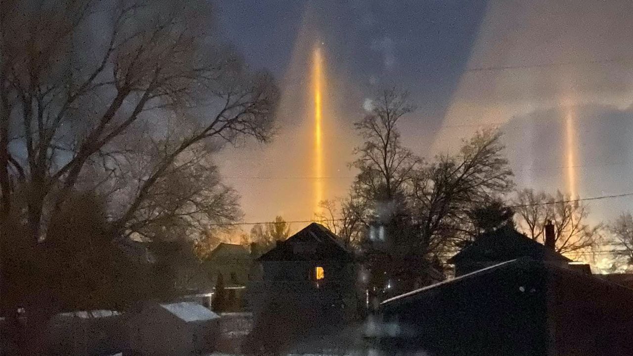 Light pillars dance across the sky in northern Michigan.