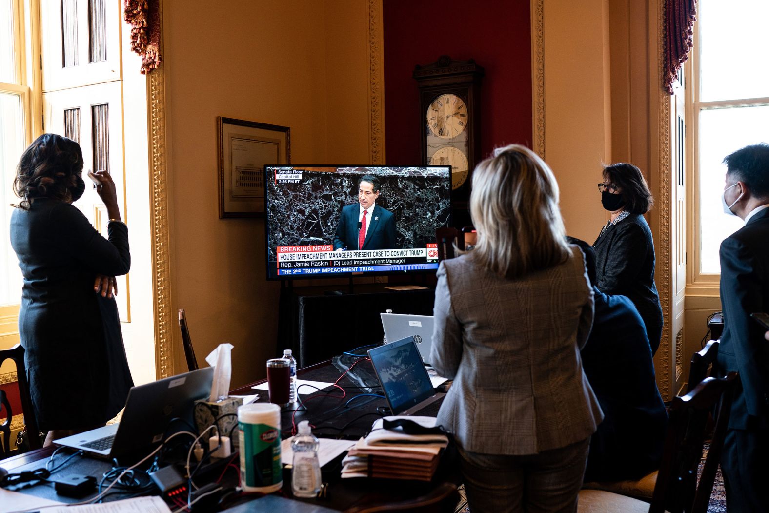 House impeachment managers watch US Rep. Jamie Raskin, the lead impeachment manager, deliver remarks on Tuesday. Raskin, a Democrat from Maryland, <a href="index.php?page=&url=https%3A%2F%2Fwww.cnn.com%2F2021%2F02%2F09%2Fpolitics%2Fjamie-raskin-impeachment-trump-senate-trial%2Findex.html" target="_blank">delivered a tearful account of his experience</a> during last month's insurrection, charging that the deadly episode "cannot be the future of America."
