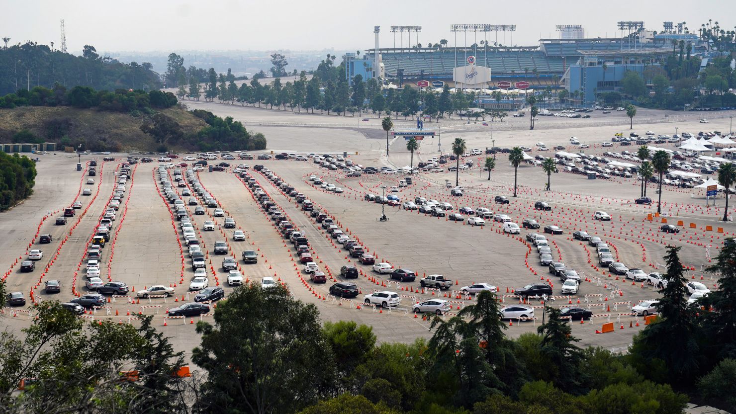 People lined up in their vehicles to get a Covid-19 vaccine at Dodger Stadium on February 10, 2021. 
