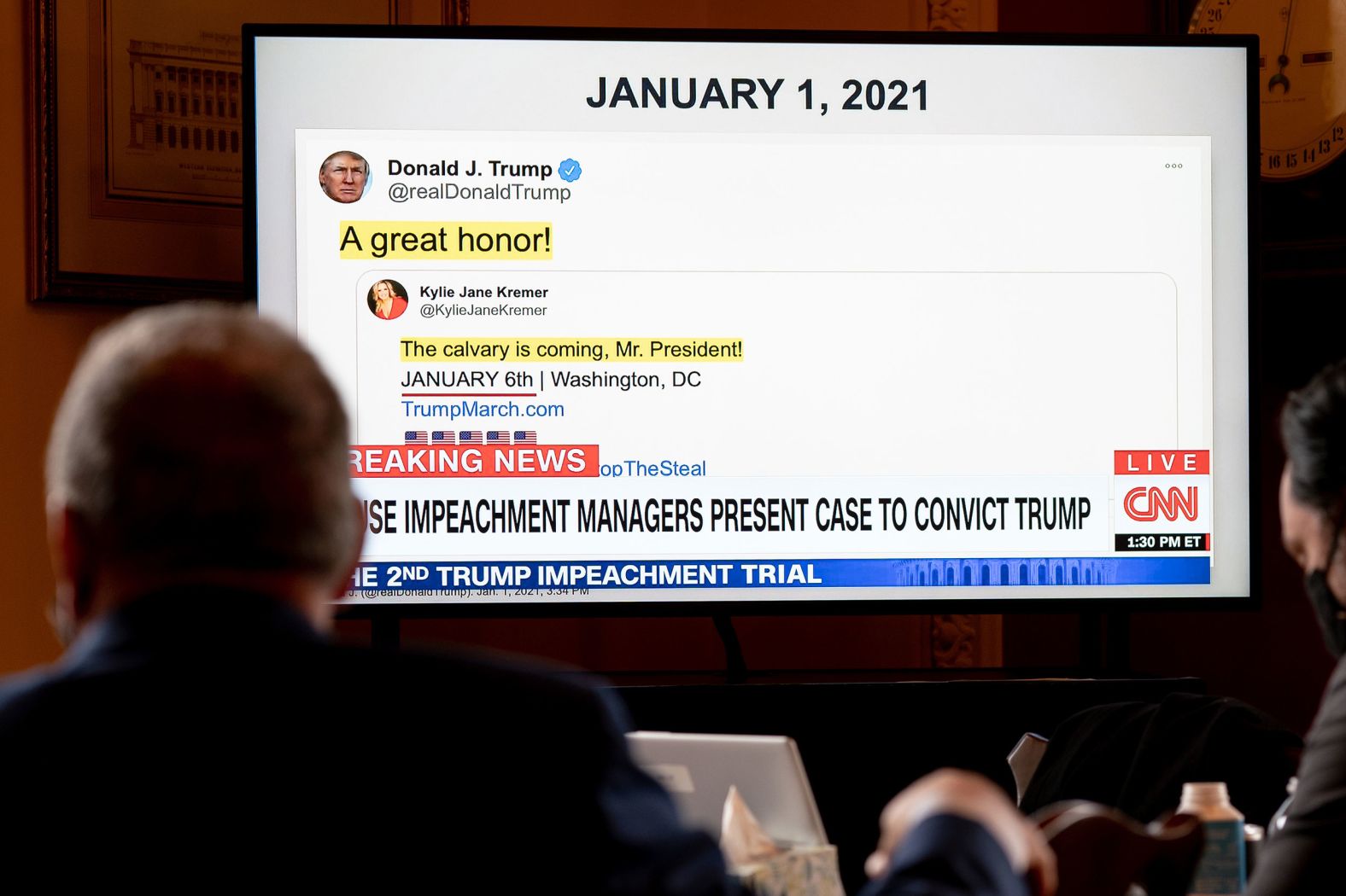 A screen at the impeachment trial shows a Trump tweet that was sent days before the storming of the Capitol. Trump's Twitter feed made a prominent appearance in Wednesday's proceedings, and House prosecutors leaned on his words and those of his supporters to argue for conviction.