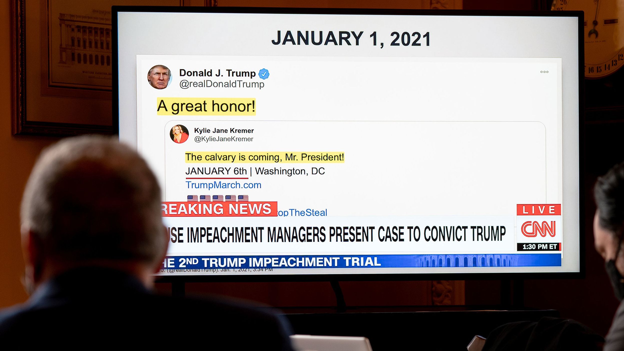 A screen at the impeachment trial shows a Trump tweet that was sent days before the storming of the Capitol. Trump's Twitter feed made a prominent appearance in Wednesday's proceedings, and House prosecutors leaned on his words and those of his supporters to argue for conviction.