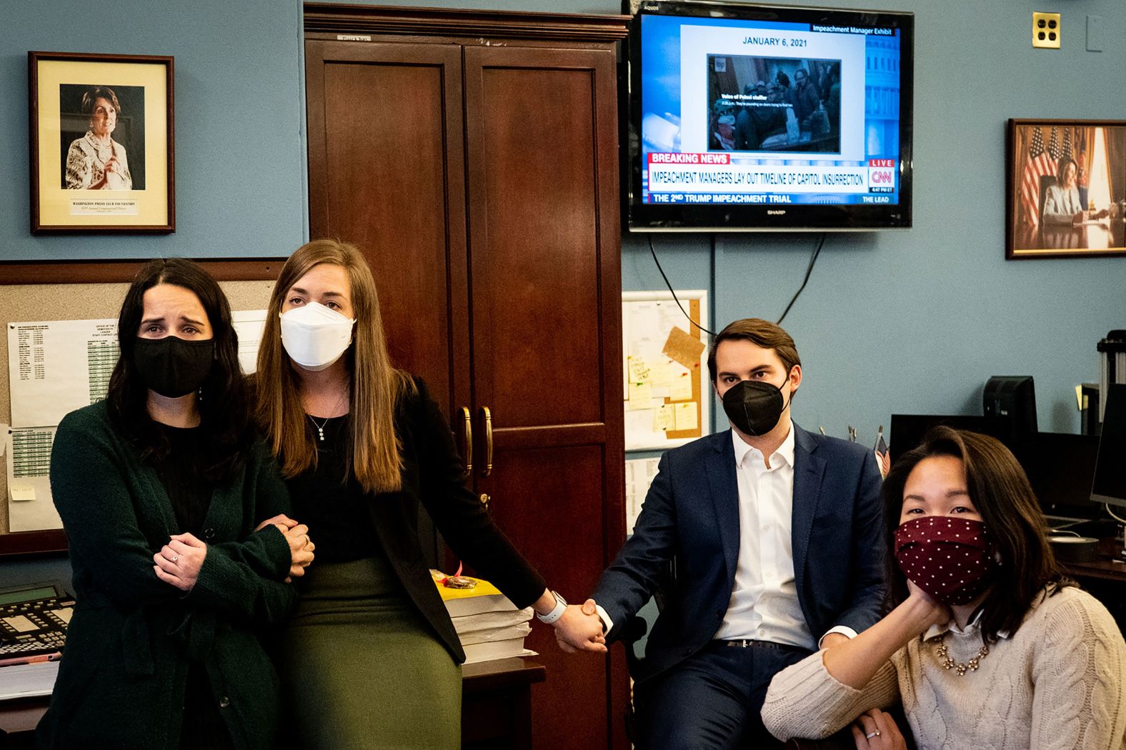 Members of Pelosi's staff watch new footage of the attack on Wednesday, February 10. The footage was part of the case presented by House impeachment managers.