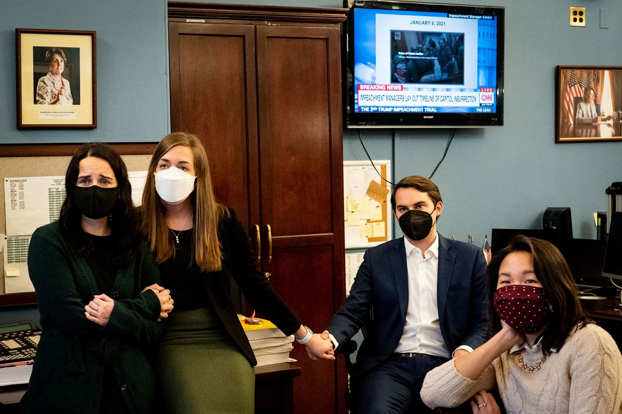 Members of Pelosi's staff watch new footage of the attack on Wednesday, February 10. The footage was part of the case presented by House impeachment managers.
