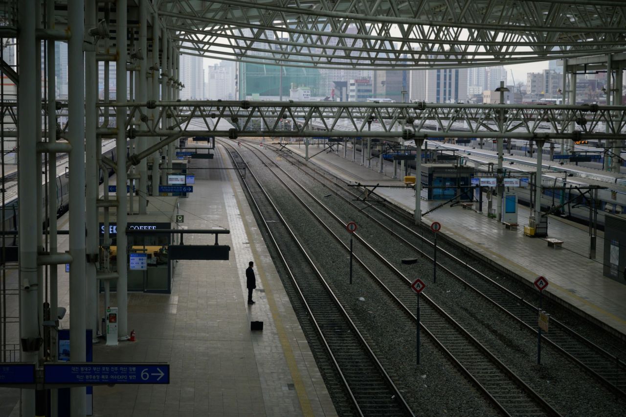 Someone waits for a train at a railway station in Seoul, South Korea, on Wednesday, February 10.