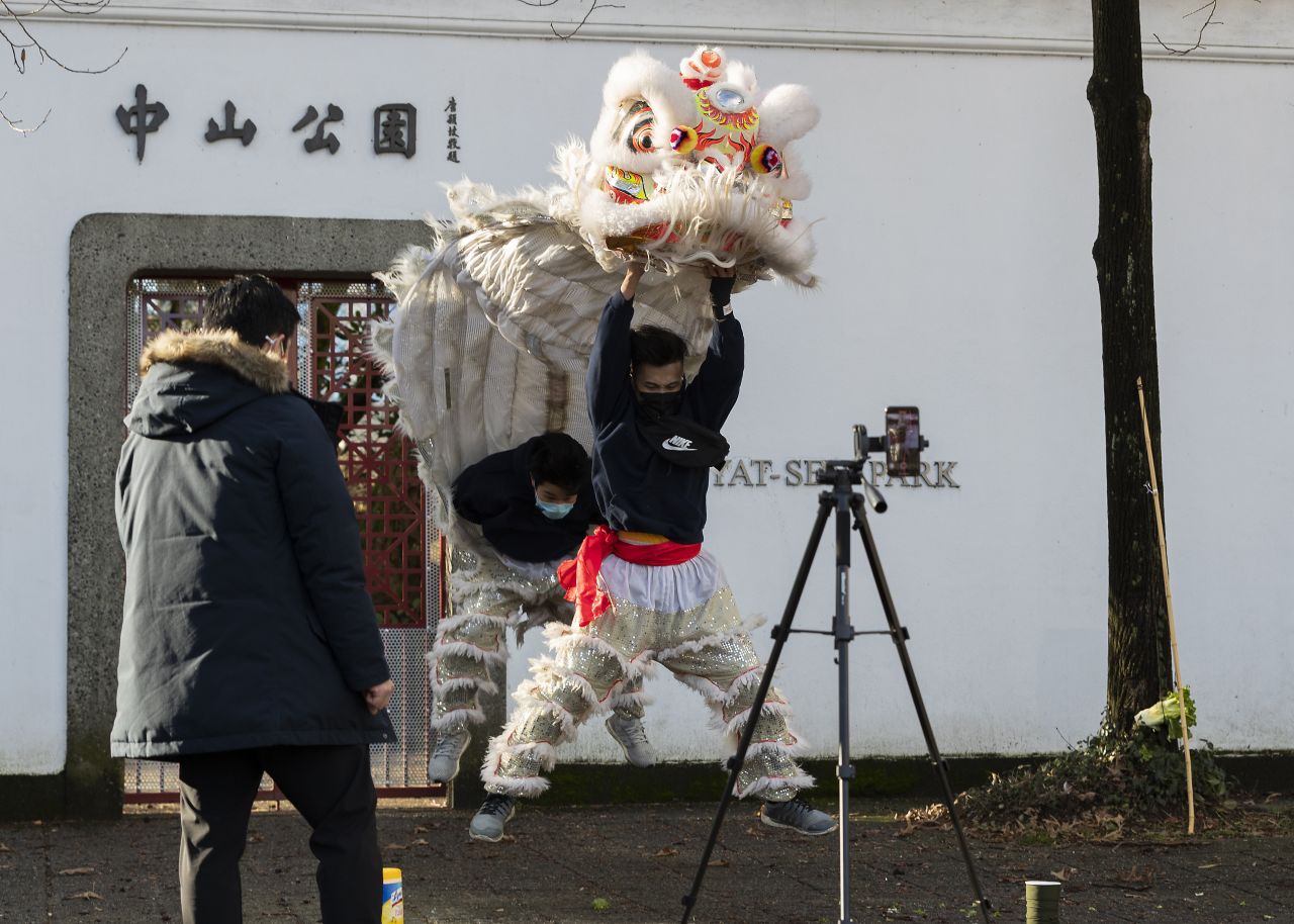 Michael Tan, president of the Chau Luen Athletic Club in Vancouver, British Columbia, records a lion dance for a virtual New Year event.