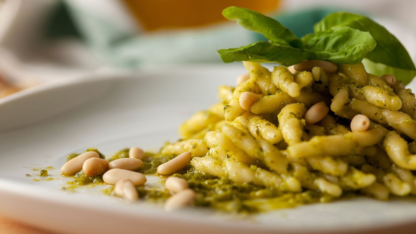 <strong>Trofie al pesto: </strong>Basil, Parmigiano Reggiano cheese, pine kernels, garlic cloves, coarse salt and extra virgin olive oil, bashed together in a Genoese marble mortar and served with trofie pasta twists.