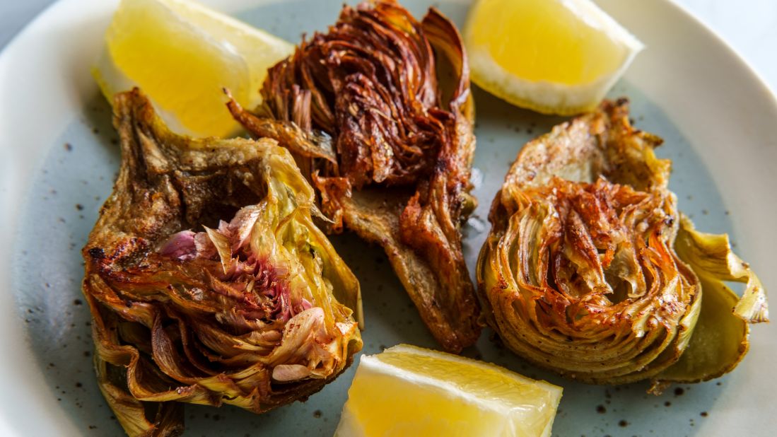 <strong>Carciofo alla giudia: </strong>A delicacy of Rome's Jewish quarter, crispy artichokes are dipped twice in frying oil at different temperatures.