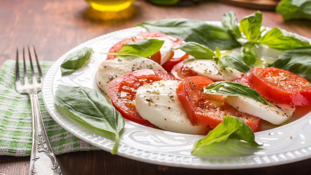 <strong>Insalata Caprese: </strong>Tomatoes, mozzarella and fresh basil -- plus a dash of the finest olive oil -- all working in harmony. 