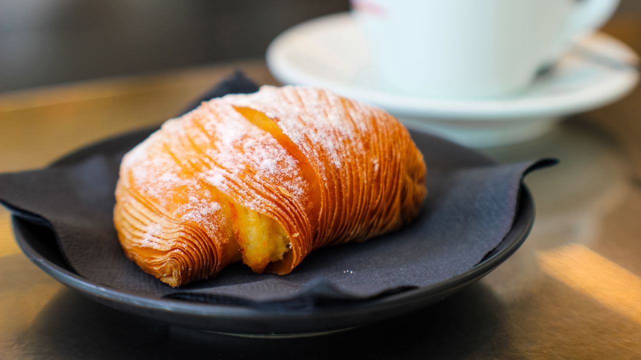 <strong>Sfogliatella: </strong>Shaped like a shell, one version of this sweet treat has crunchy layers of puff pastry stuffed with fresh sweet ricotta cheese, crushed candied orange bits, vanilla and cinnamon. It's sprinkled with sugar. 