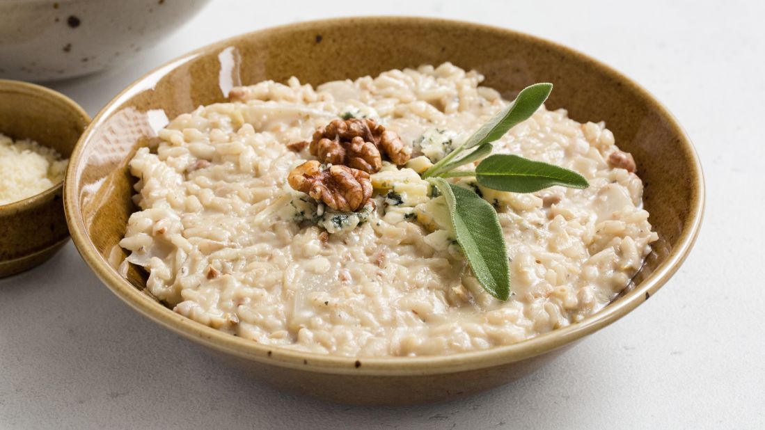 <strong>Risotto al Gorgonzola: </strong>Born on the border between Lombardy and Piedmont, this dish uses local rice varieties to slowly absorb vegetable broth, with Gorgonzola cheese added at the end.