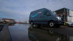 An Amazon Prime truck drives in Pacifica, Calif., Tuesday, Dec. 15, 2020. (AP Photo/Jeff Chiu)