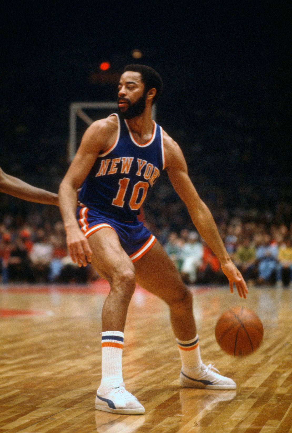 Walt "Clyde" Frazier in 1971 shown here playing basketball with the first iteration of the "Puma Clyde" shoes.