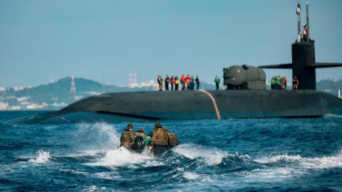 US Marines utilize combat rubber raiding crafts to approach the USS Ohio during an integration exercise off the coast of Okinawa, Japan, this month. 