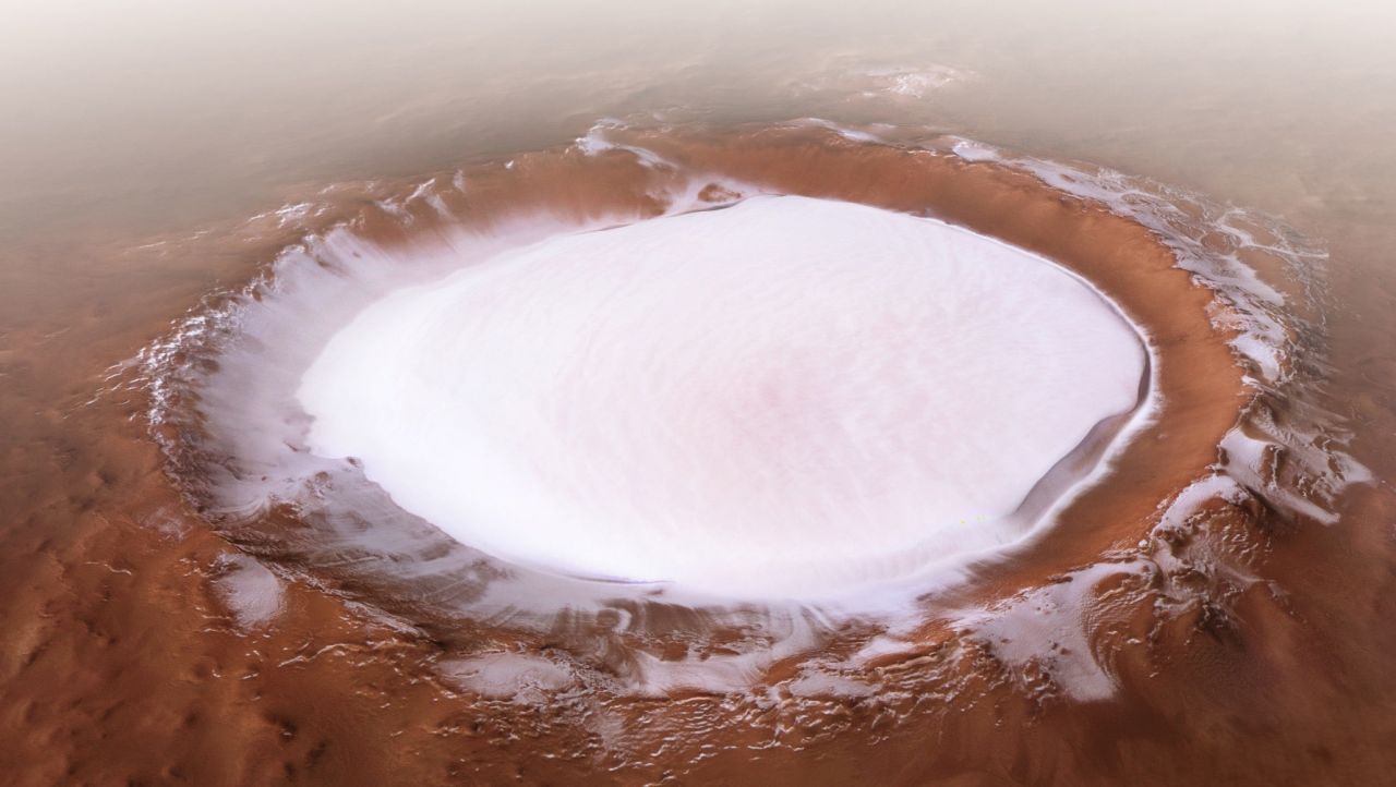 The European Space Agency's Mars Express mission captured this 2018 image of the Korolev crater, more than 50 miles across and filled with water ice, near the north pole. 