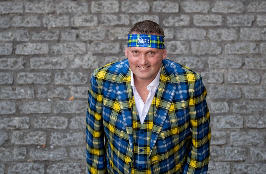 Weir has become known for his colourful tartan suits. 