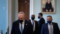 Senate Majority Leader Charles E. Schumer (D-NY) walks to the Senate floor during the fourth day of former US President Donald Trump's impeachment trial before the Senate on Capitol Hill February 12, 2021, in Washington, DC. 