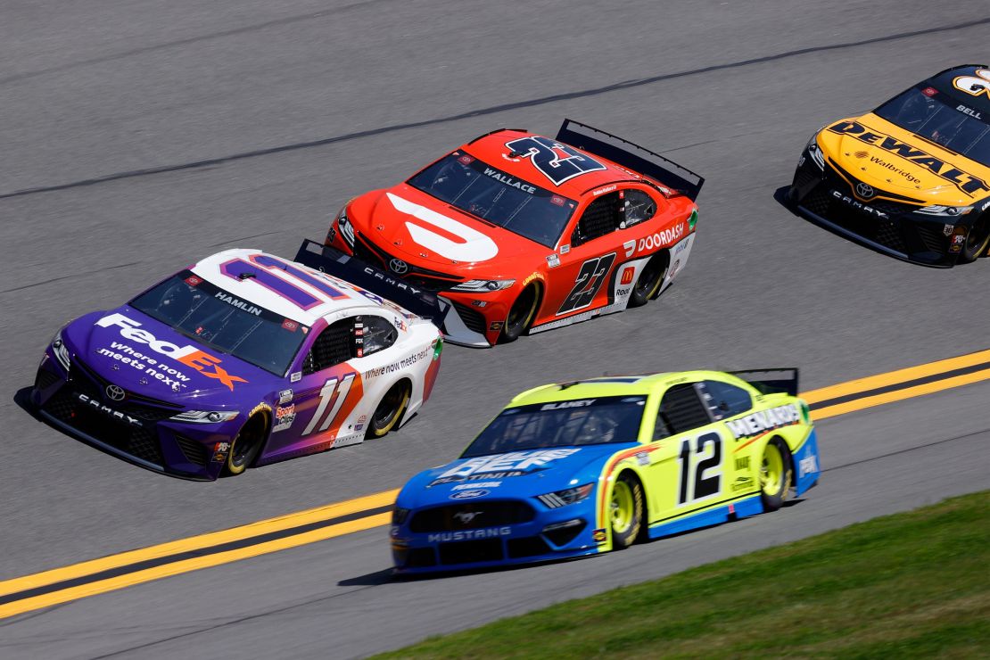 Drivers Denny Hamlin in the No. 11 FedEx Toyota, Bubba Wallace, in the No. 23 DoorDash Toyota, and Ryan Blaney in the No. 12 Menards/Blue DEF/PEAK Ford during practice laps 63rd Annual Daytona 500 at Daytona International Speedway on February 10, 2021. 