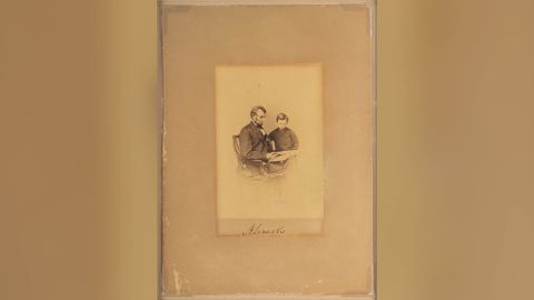 Original albumen 3.75ʺ x 5.25ʺ photograph of President Abraham Lincoln with his son Tad, taken by Mathew Brady on February 9, 1864.