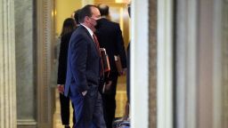 Sen. Mike Lee (R-UT) heads to the Senate Chamber before the fifth day of the Senate Impeachment trials for former President Donald Trump on Capitol Hill on February 13, 2021 in Washington, DC. 