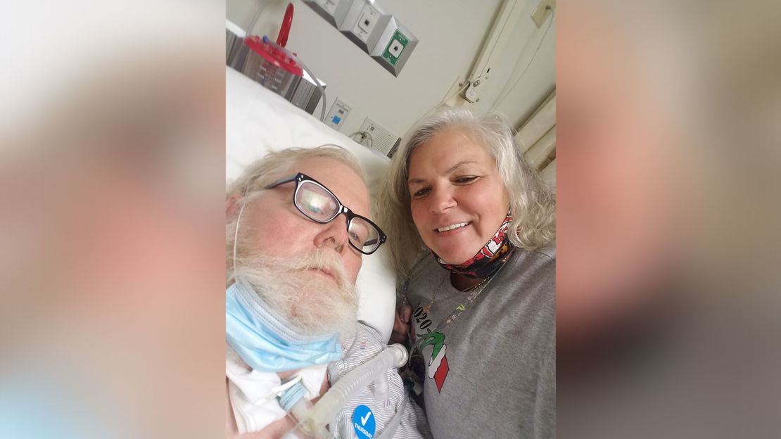 Roger Collins and his wife, Billie, in his hospital bed.