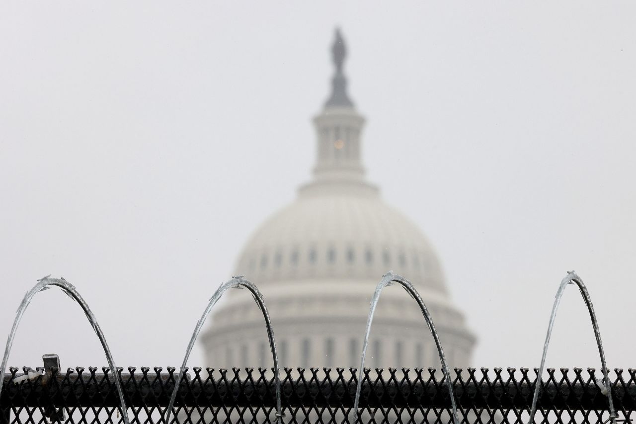 Razor wire is shown atop a fence outside the Capitol on Saturday. There has been extraordinary security inside and outside the Capitol this week.