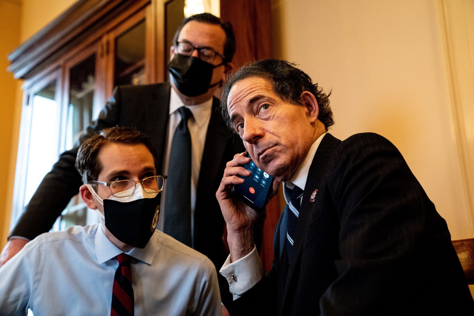 US Rep. Jamie Raskin, the lead impeachment manager, talks on the phone before the start of Saturday's proceedings.