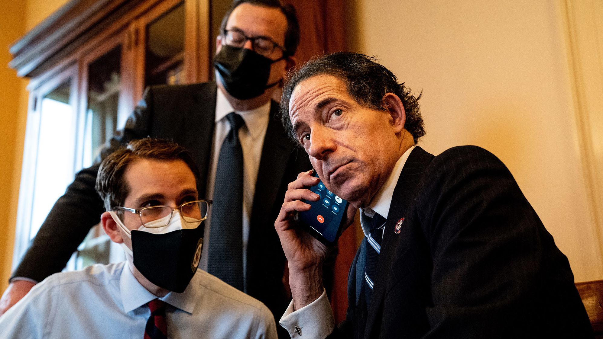 US Rep. Jamie Raskin, the lead impeachment manager, talks on the phone before the start of Saturday's proceedings.