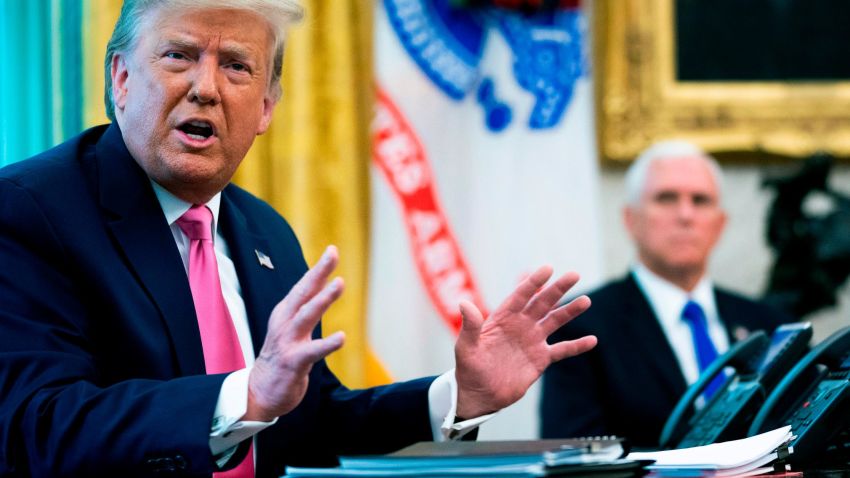 WASHINGTON, DC - JULY 20: U.S. President Donald Trump talks to reporters with Vice President Mike Pence in the Oval Office at the White House July 20, 2020 in Washington, DC. Trump hosted Republican Congressional leaders and members of his cabinet to talk about a proposed new round of financial stimulus to help the economy during the ongoing global coronavirus pandemic.  (Photo by Doug Mills-Pool/Getty Images)