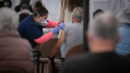LOS ANGELES, CA - FEBRUARY 11: A nurse administers the COVID-19 vaccine at Kedren Health on Thursday, Feb. 11, 2021 in Los Angeles, CA. (Jason Armond / Los Angeles Times via Getty Images)